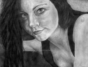 Amy Lee drawing. This is a very old drawing of mine. A pencil portrait of singer/songwriter Amy Lee.  As you can see, it's not one of my most detailed pieces and it's a bit rough around the edges. ​ A bit of a mix of materials were used. HB pencil for the main and pastels on some of the darker areas and hair.​